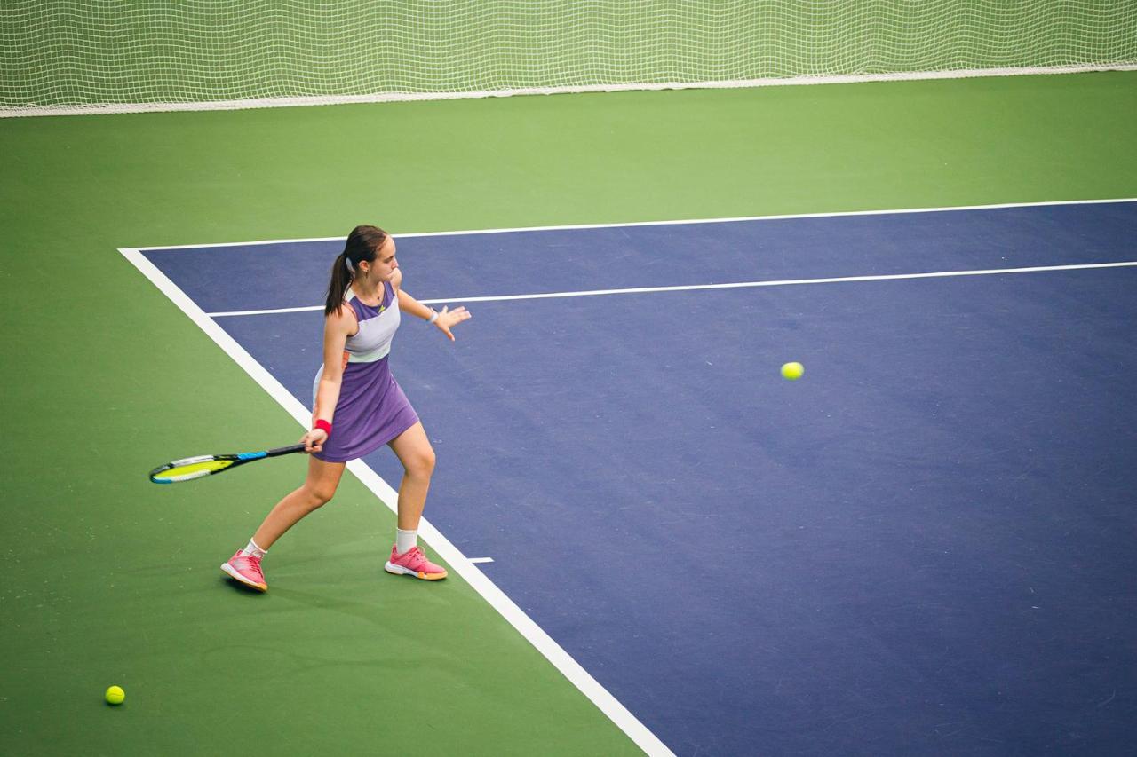 The Oceanic Sportel Phuket - Sha Extra Plus Exterior photo A player preparing to hit a forehand